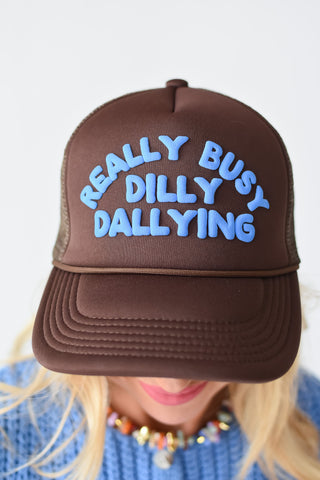 Really Busy Dilly Dallying Trucker Hat in Brown/Blue