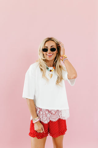 Quinn Asymmetrical Lace Hem Tee in Off White