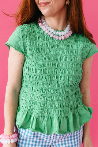 Teagan Smocked Ruffle Hem Top in Green