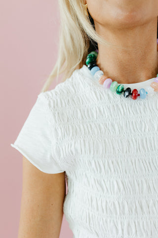 Teagan Smocked Ruffle Hem Top in Off White