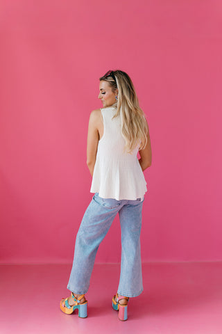 Nina Ribbed Peplum Knit Top in Off White